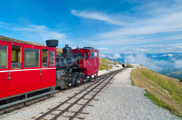 Cog railway train climbing up to the mountain Stock photo © macsim