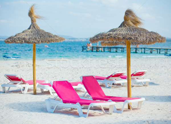 chairs and umbrella on the beach Stock photo © macsim
