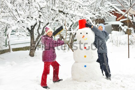 雪だるま 子供 建物 雪 冬 楽しい ストックフォト © mady70