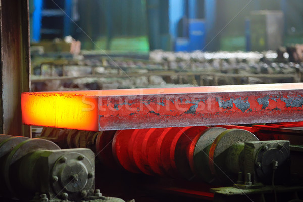 Stock photo: hot steel on conveyor