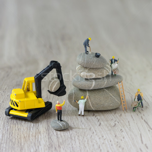 Construction site with miniature workers Stock photo © mady70