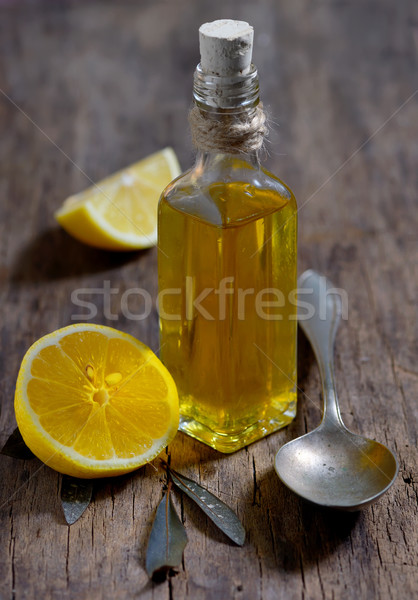 Olive oil and  lemon fruits on the wooden table Stock photo © mady70