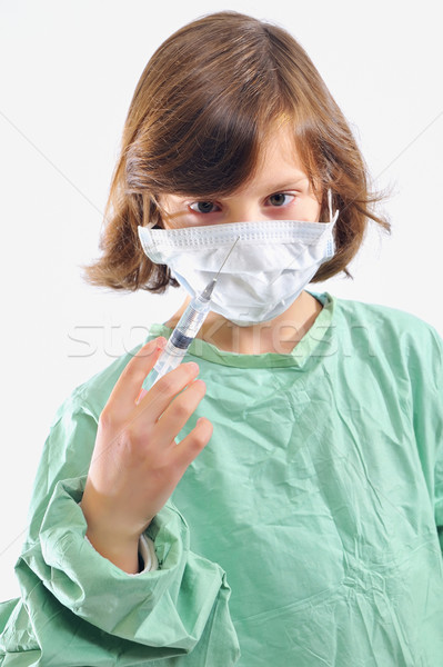 Stock photo: girl in uniform giving injection