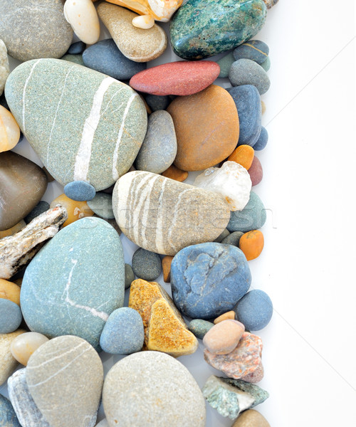 Stock photo: colored stones on white background