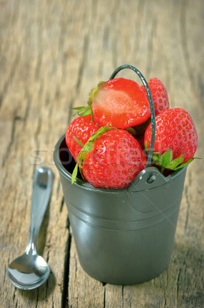 Fresh strawberries in bucke Stock photo © mady70