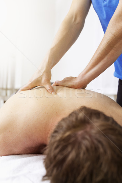 Jeune homme thérapie image homme santé massage Photo stock © magann