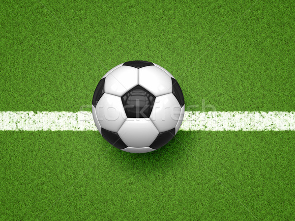 Stock photo: soccer ball on green grass