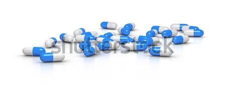 Kék tabletták kép fehér egészség háttér Stock fotó © magann