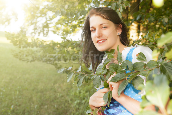 Kadın geleneksel gökyüzü kız gülümseme arka plan Stok fotoğraf © magann