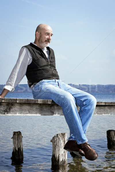 Yaşlı adam gri sakal oturma yüz adam Stok fotoğraf © magann
