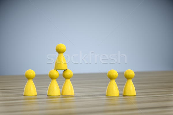 game figures building a pyramid Stock photo © magann