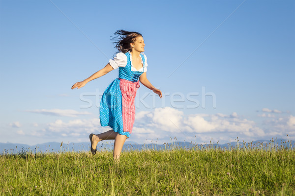 Kadın geleneksel gökyüzü kız gülümseme doğa Stok fotoğraf © magann