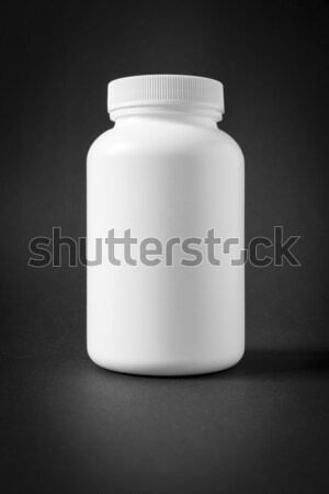 white plastic jar isolated on black Stock photo © magann
