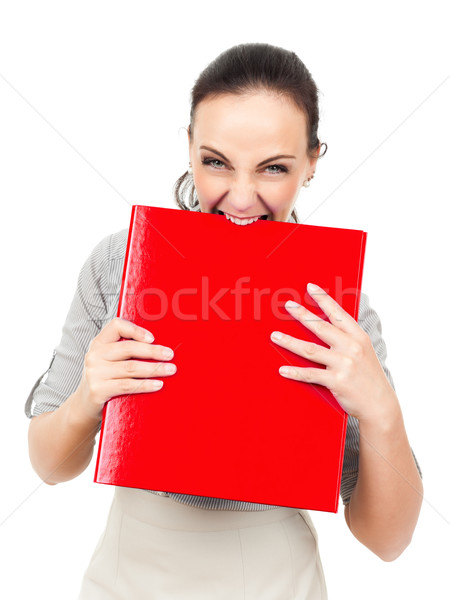 business woman bites in a red binder Stock photo © magann