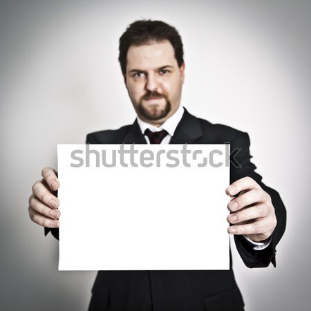 Mutat papír jóképű fiatalember kecskeszakáll szakáll Stock fotó © magann