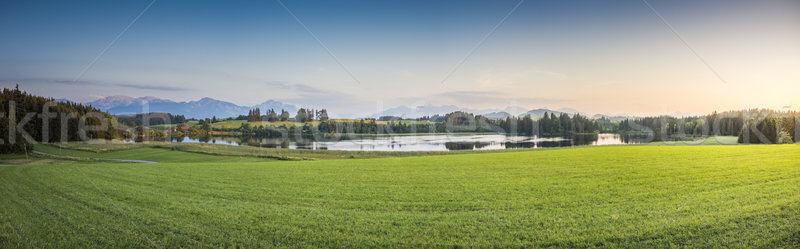 Paisagem imagem lago céu água pôr do sol Foto stock © magann