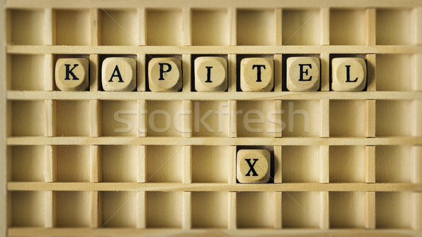 Kapitel zehn Sprache Bild Holz Spiel Stock foto © magann