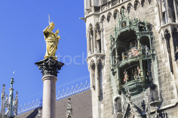 the golden Maria statue in Munich with the city hall Stock photo © magann