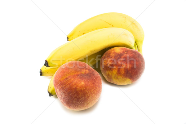 Banán őszibarackok friss fehér étel banán Stock fotó © magraphics