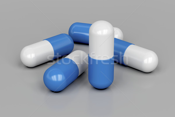Capsules on gray Stock photo © magraphics