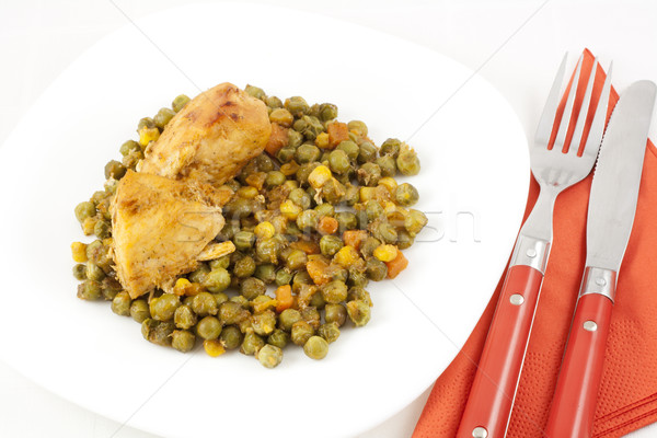 Chicken meat with green peas, carrots and corns on table Stock photo © magraphics