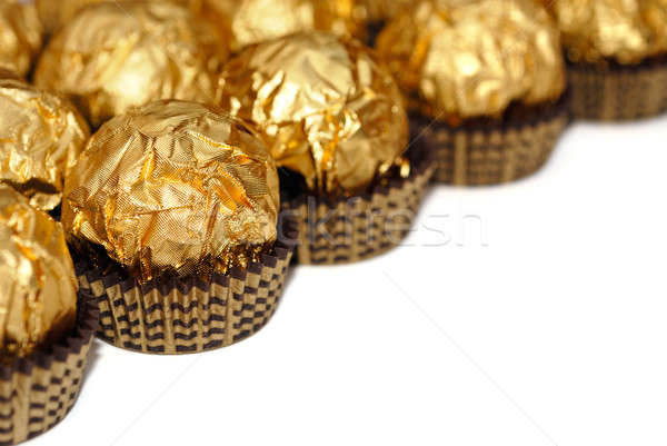 Sweets in wrapper isolated Stock photo © mahout