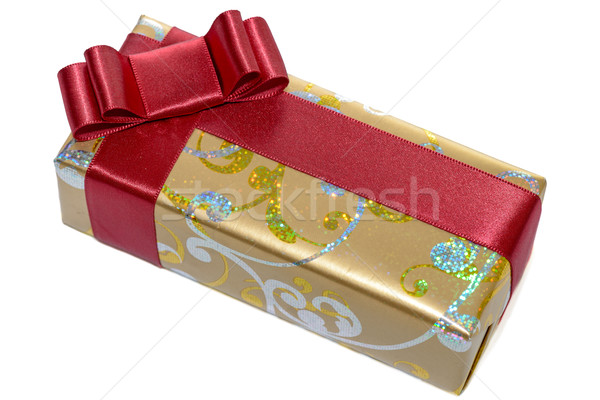 Gift with red ribbon and bow isolated on white Stock photo © mahout
