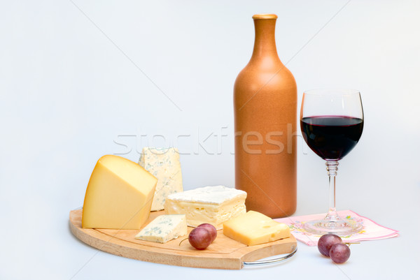 Glass of wine bottle and cheese Stock photo © mahout