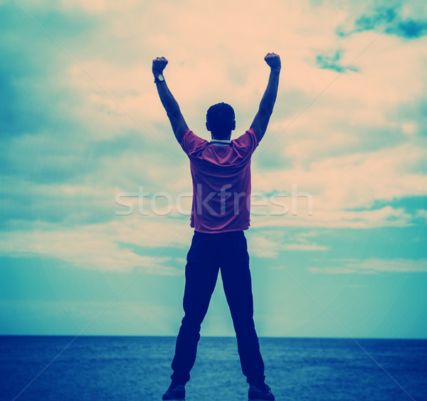 Calm young man enjoying the sunset Stock photo © majdansky