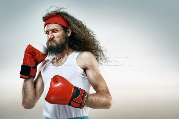 Funny boxer wearing red boxing gloves Stock photo © majdansky