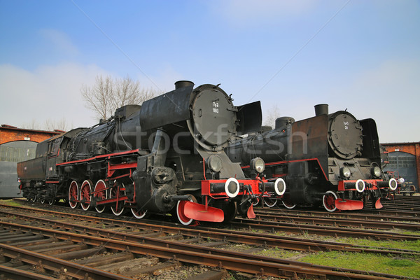Two huge antique locomotives nex to the garage Stock photo © majdansky