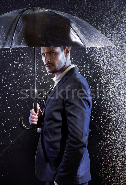 Knap jonge man paraplu mode achtergrond Stockfoto © majdansky