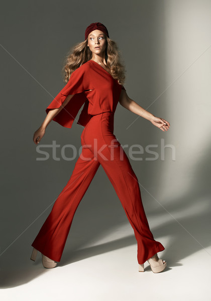 Mode photo jeune femme rouge costume [[stock_photo]] © majdansky