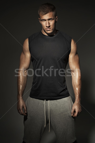 Fit and musclar guy wearing sports clothes Stock photo © majdansky