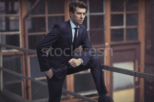Elegant man weaing dark suit Stock photo © majdansky