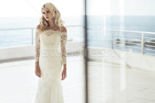 Serious young bride in the hotel's room Stock photo © majdansky