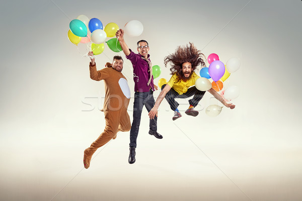 Portrait of group of funny friends on a party Stock photo © majdansky
