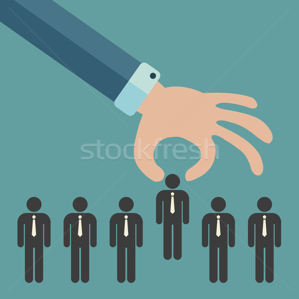 Choosing the best candidate for the job concept. Hand picking up a businessman stick figure from the Stock photo © makyzz