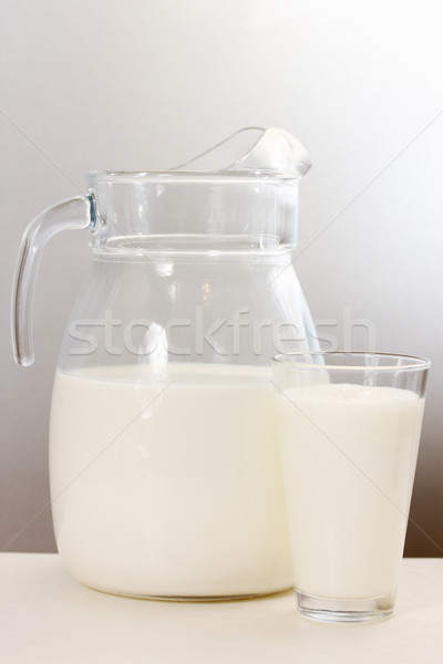 decanter and glass filled with milk Stock photo © mallivan