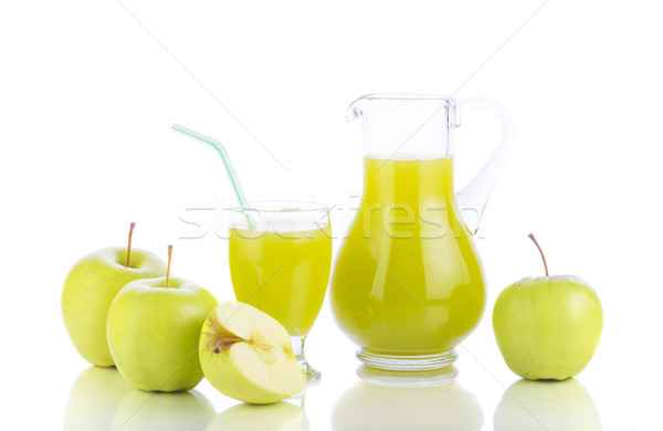 Apple juice and slices of apple on white Stock photo © manaemedia