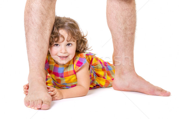 Little daughter at the feet of her father Stock photo © manaemedia