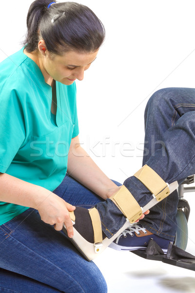 Orthopédique équipement jeune homme fauteuil roulant patient industrie [[stock_photo]] © manaemedia