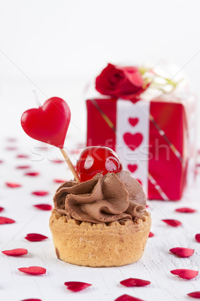 cup-cake with cherry in front of gift box  Stock photo © manaemedia