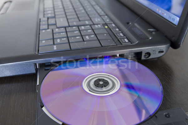 Szoftver laptop cd tálca iroda munka Stock fotó © manaemedia