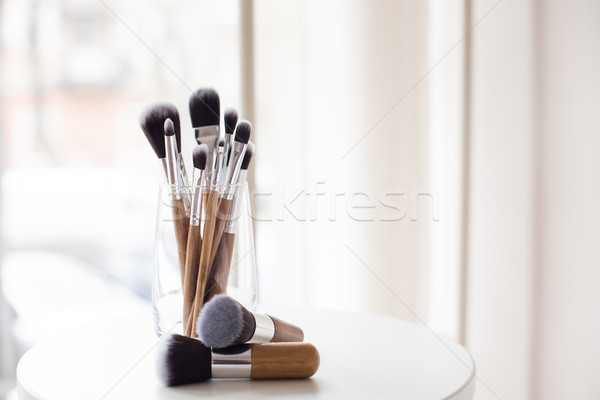 Professional makeup brushes in a glass Stock photo © manera