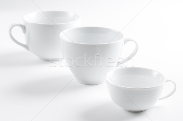 Három különböző fehér csészék konyha űr Stock fotó © manera