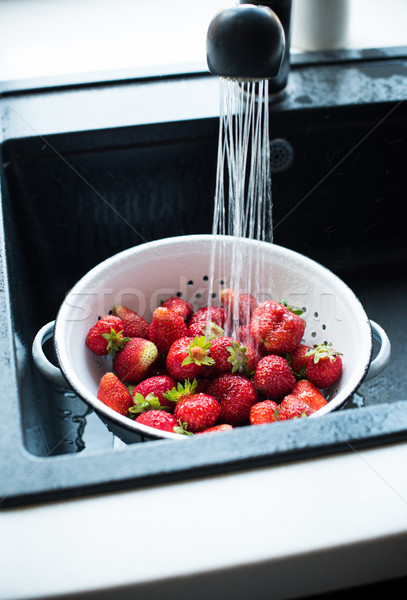 organic strawberries in colander Stock photo © manera