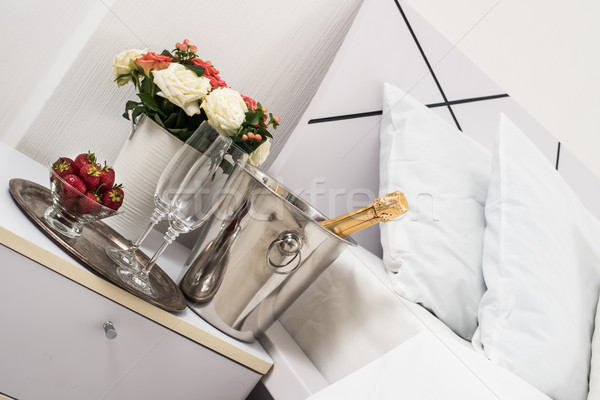 Stock photo: Champagne in bed