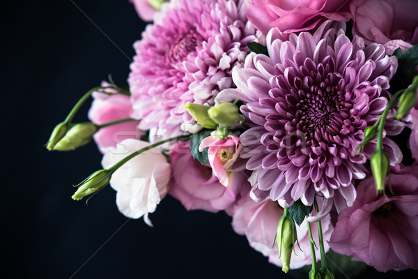 Bouquet of pink flowers closeup on black background Stock photo © manera