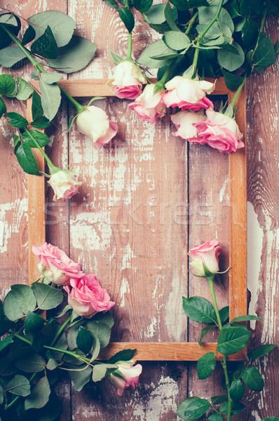 pink roses and a wooden frame Stock photo © manera